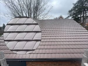 Clean tiled roof after professional roof cleaning and biocide treatment
